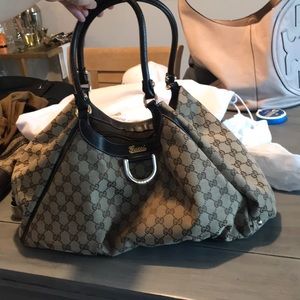 GUCCI
Beige/Ebony GG Canvas D Ring Large Hobo Bag
